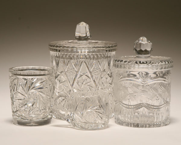 Appraisal: Four pieces of cut and pressed glass including biscuit jars