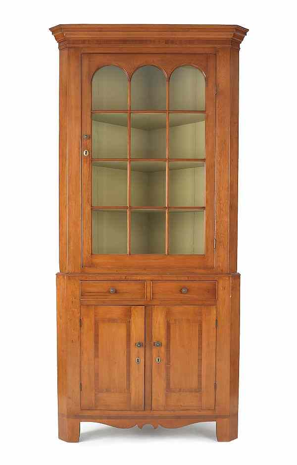 Appraisal: Pennsylvania Federal cherry two-part corner cupboard early th c h