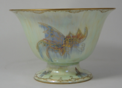 Appraisal: Wedgwood Lustre footed vase decorated with butterflies diameter cm height