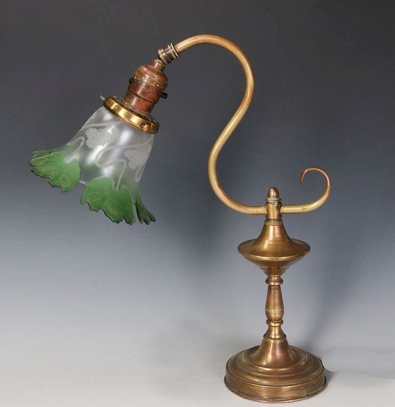 Appraisal: A BRASS LAMP WITH UNUSUAL CUT BACK SHADE C A