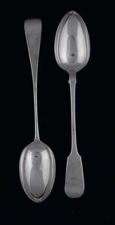 Appraisal: TWO VICTORIAN GRAVY SPOONS Fiddle and Old English patterns crested