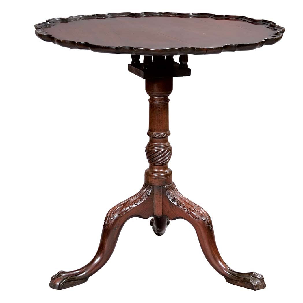 Appraisal: George II Mahogany Tip-Top Table The circular piecrust top raised