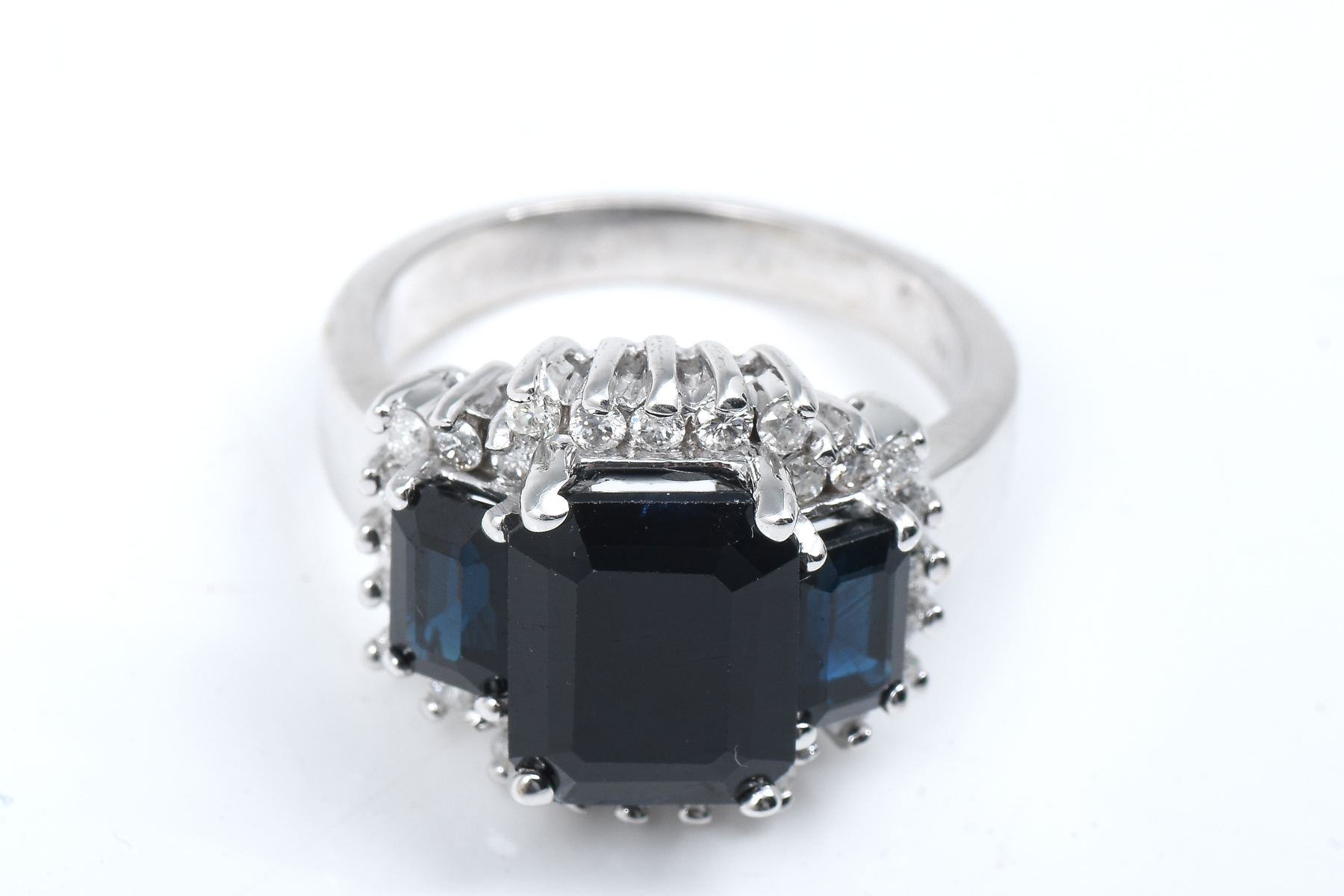 Appraisal: K CTW BLUE SAPPHIRE DIAMOND RING blue emerald cut sapphires