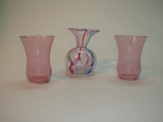 Appraisal: A pair of pink and white swirl vases and a