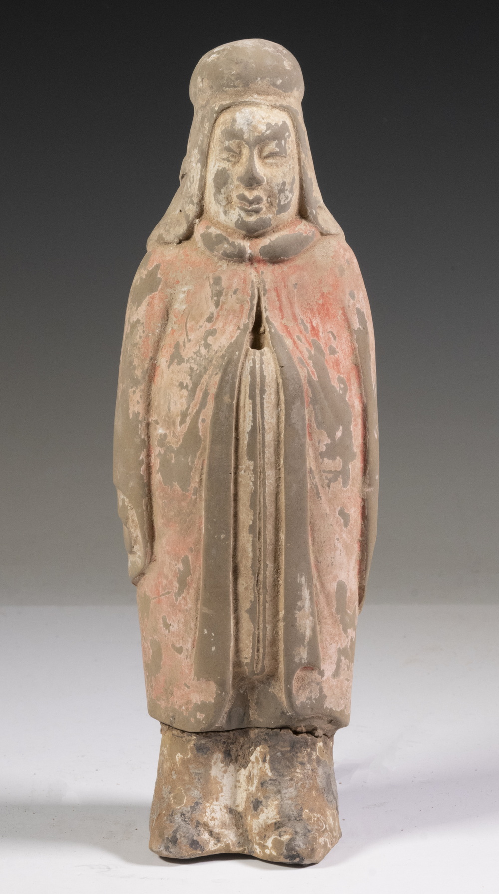 Appraisal: CHINESE NORTHERN QI - AD STANDING POTTERY PRIEST Minqii in