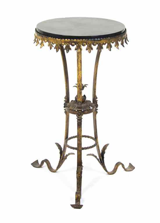 Appraisal: A Continental Wrought Iron Pedestal Table having a circular black