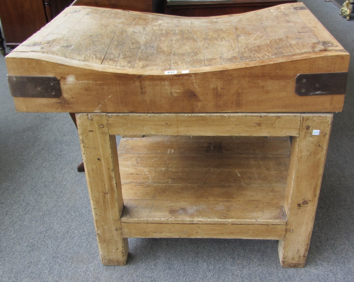 Appraisal: A rectangular beech and pine butchers block on square supports