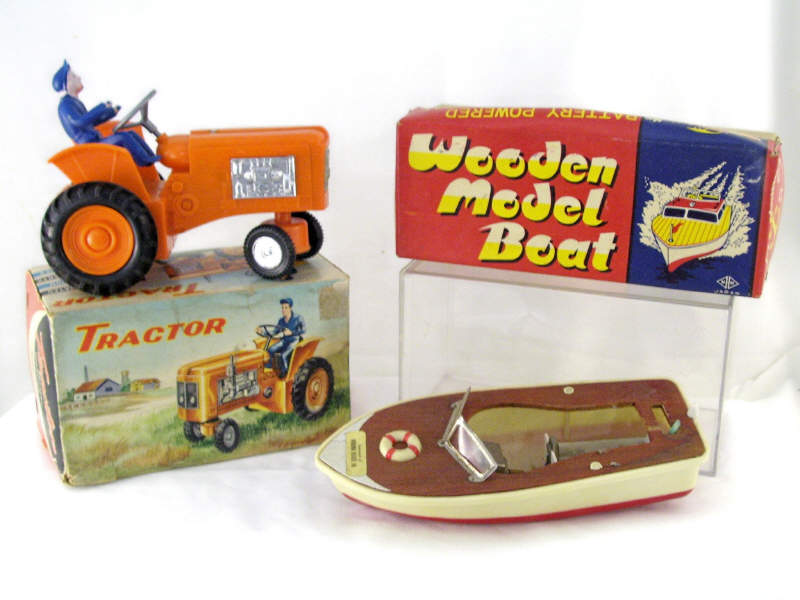 Appraisal: - Battery Operated Toys Includes Tractor orange plastic body mystery