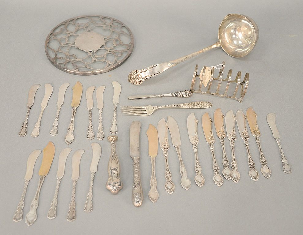 Appraisal: Sterling silver lot including butter knives toast holder and large