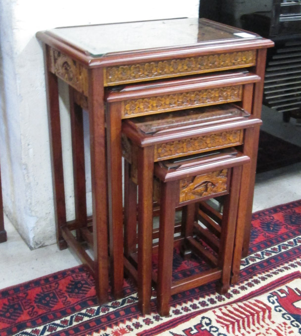 Appraisal: NESTING TABLE SET Chinese th century featuring four graduated occasional