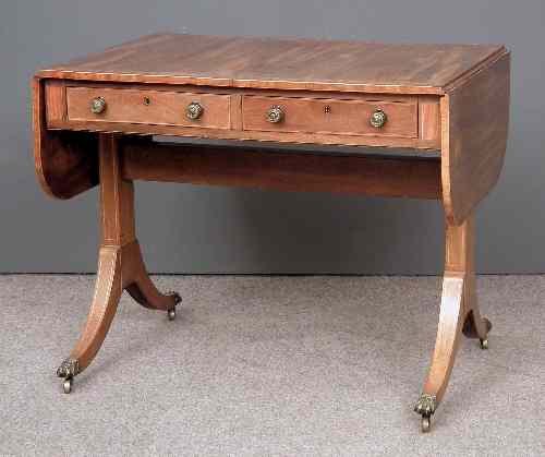 Appraisal: A George IV mahogany sofa table the top with satinwood