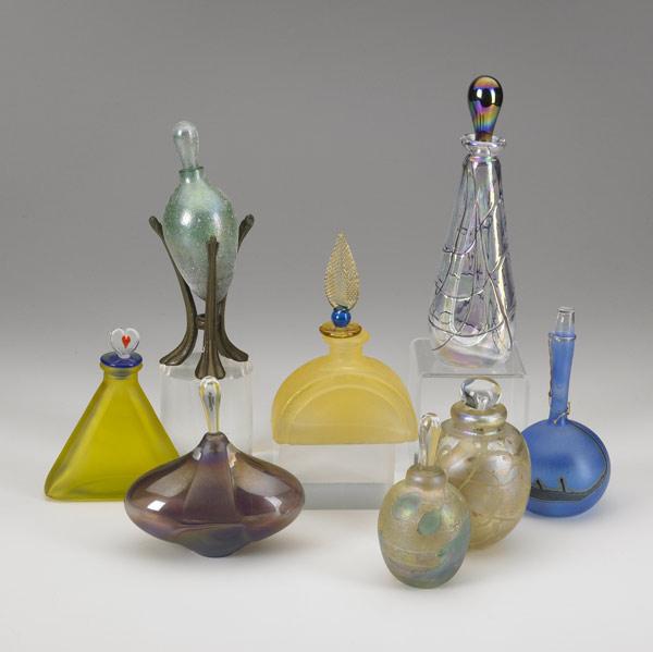 Appraisal: ART GLASS PERFUMES Group of eight with iridescent finishes some