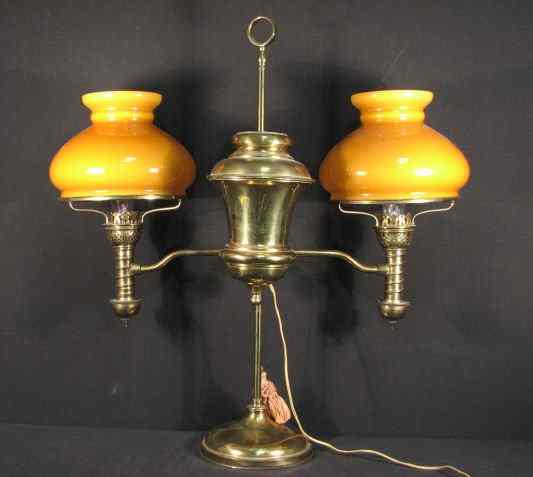 Appraisal: Brass double student electrified oil lamp with amber cased glass