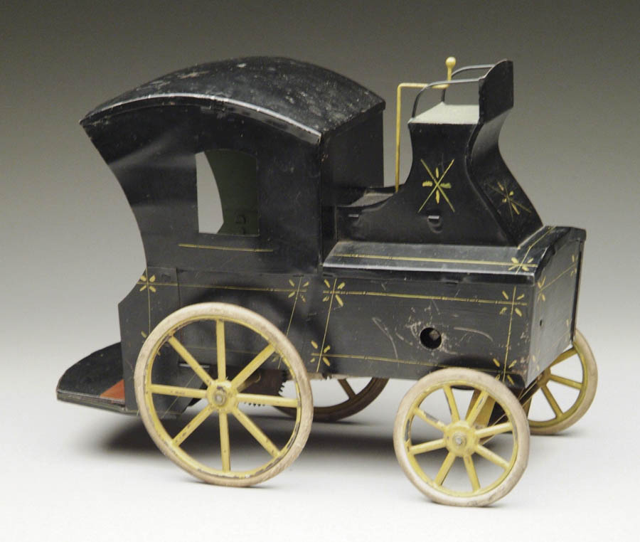 Appraisal: RARE CONVERSE HANSOM CAB Early clockwork tin vehicle painted black