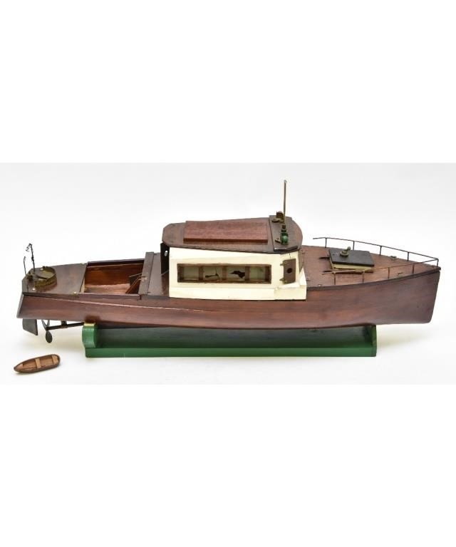 Appraisal: Mahogany battery operated motor yacht circa mounted on a cradle