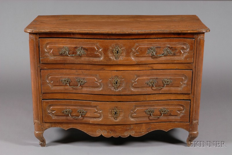 Appraisal: Louis XV Provincial Walnut Three-Drawer Commode late th century serpentine