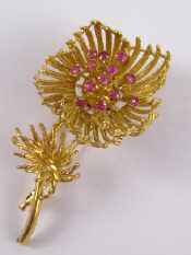 Appraisal: A yellow metal tests carat gold pin untested floral brooch