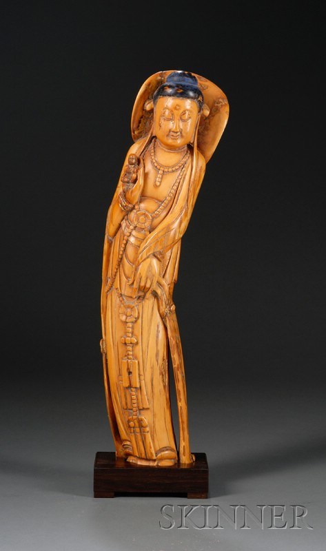 Appraisal: Ivory Carving China Ming style th century standing figure of