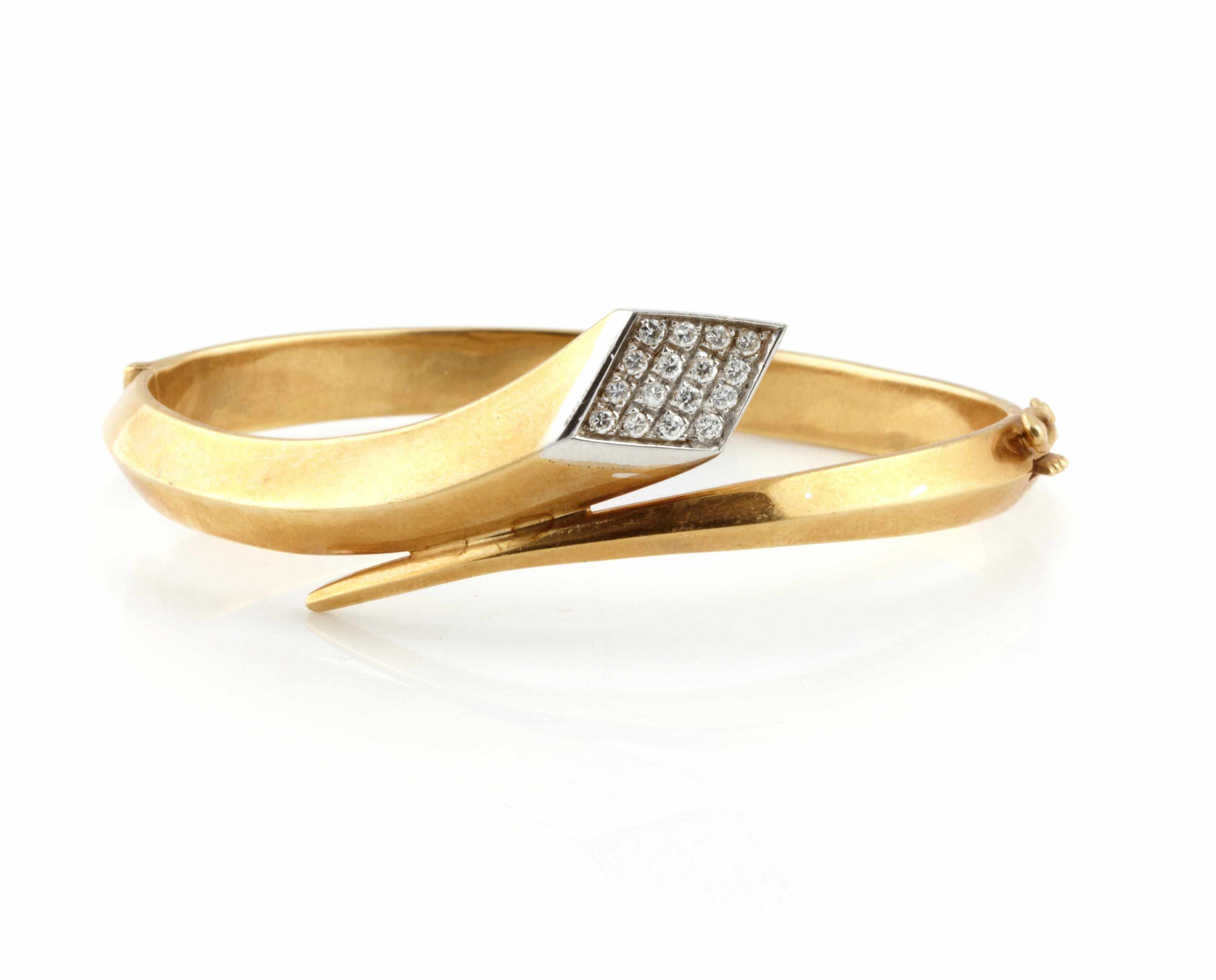 Appraisal: A diamond and k bicolor gold bangle diameter in g