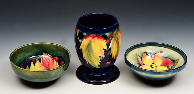 Appraisal: Moorcroft'Leaf and Berry' vase cm high and two small bowls