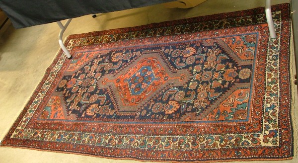 Appraisal: TWO SEMI-ANTIQUE PERSIAN TRIBAL AREA RUGS each centering a single