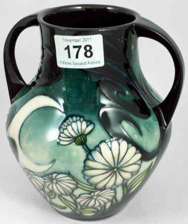 Appraisal: Moorcroft Two Handled Vase decorated in the Winters Moon design