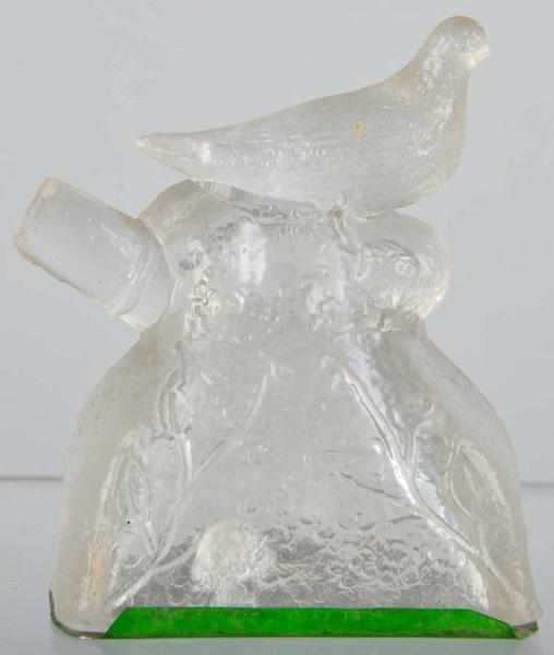 Appraisal: Glass Bird Sitting on Bush Candy Container Description Original bottom