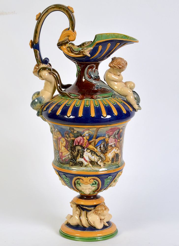 Appraisal: Large Hand Painted Majolica Pitcher Majolica pitcher with cherubs at