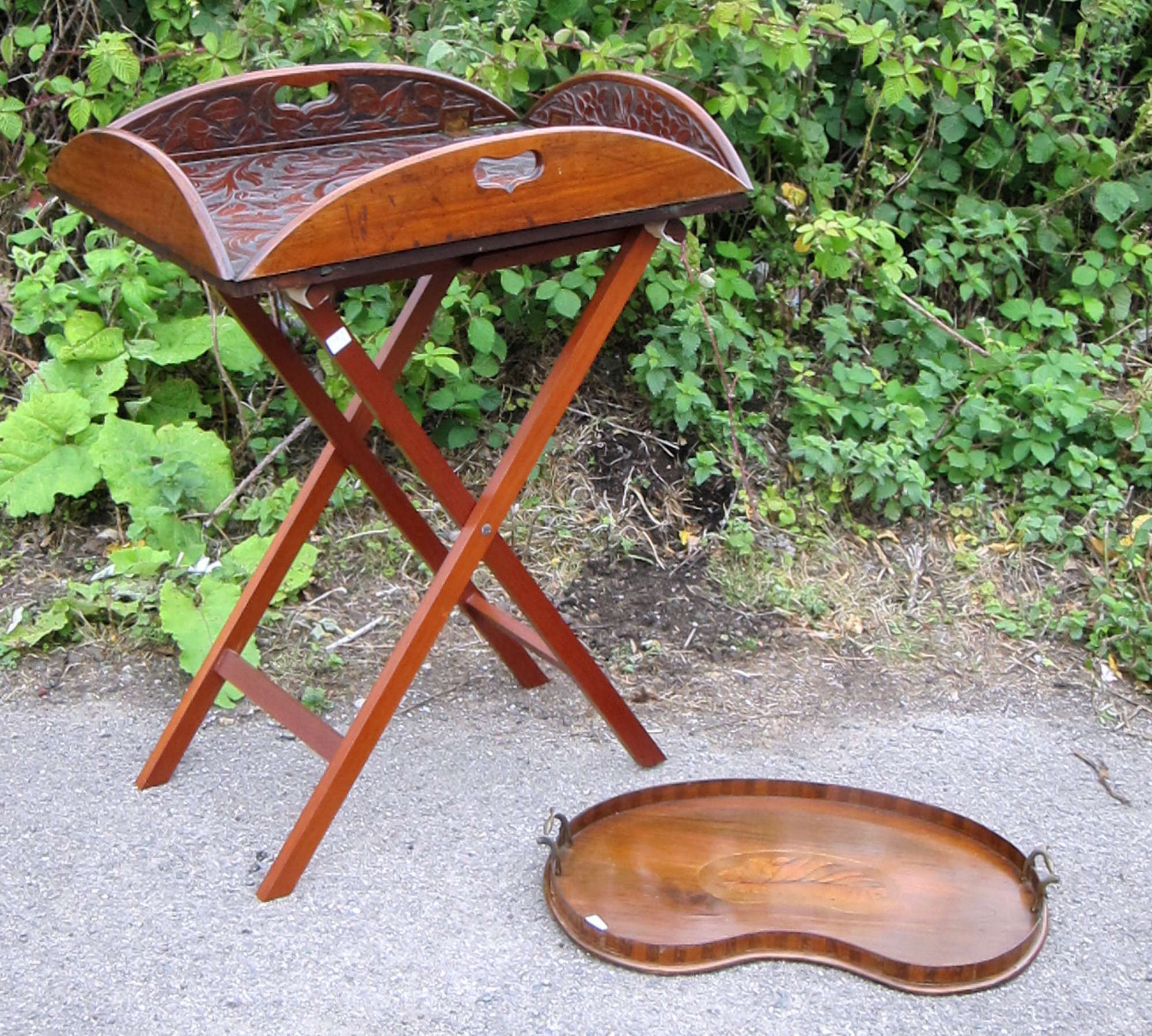 Appraisal: Early th century carved mahogany butler's tray on later stand