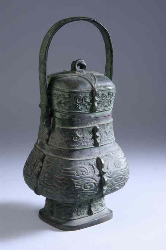 Appraisal: CHINESE ARCHAISTIC BRONZE VESSEL Taotie mask decoration - in with