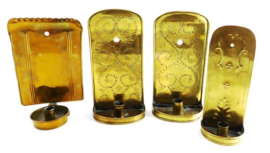 Appraisal: Four brass wall sconces with round piercings for hanging pair