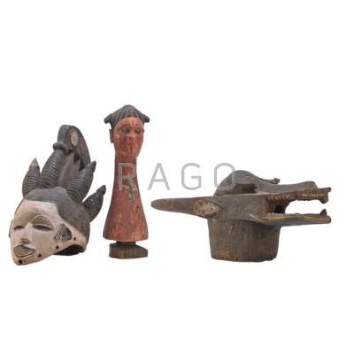 Appraisal: AFRICAN HEADDRESSES Three th c Ibo Bush and Kubu Tallest