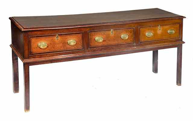 Appraisal: A GEORGE III OAK DRESSER BASE the top with a