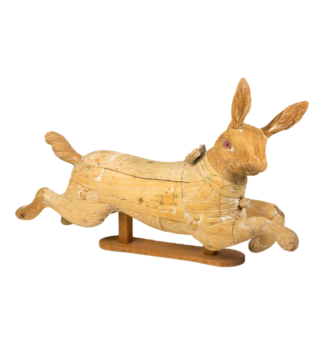 Appraisal: A CARVED CAROUSEL RABBIT A carved carousel rabbit modeled leaping