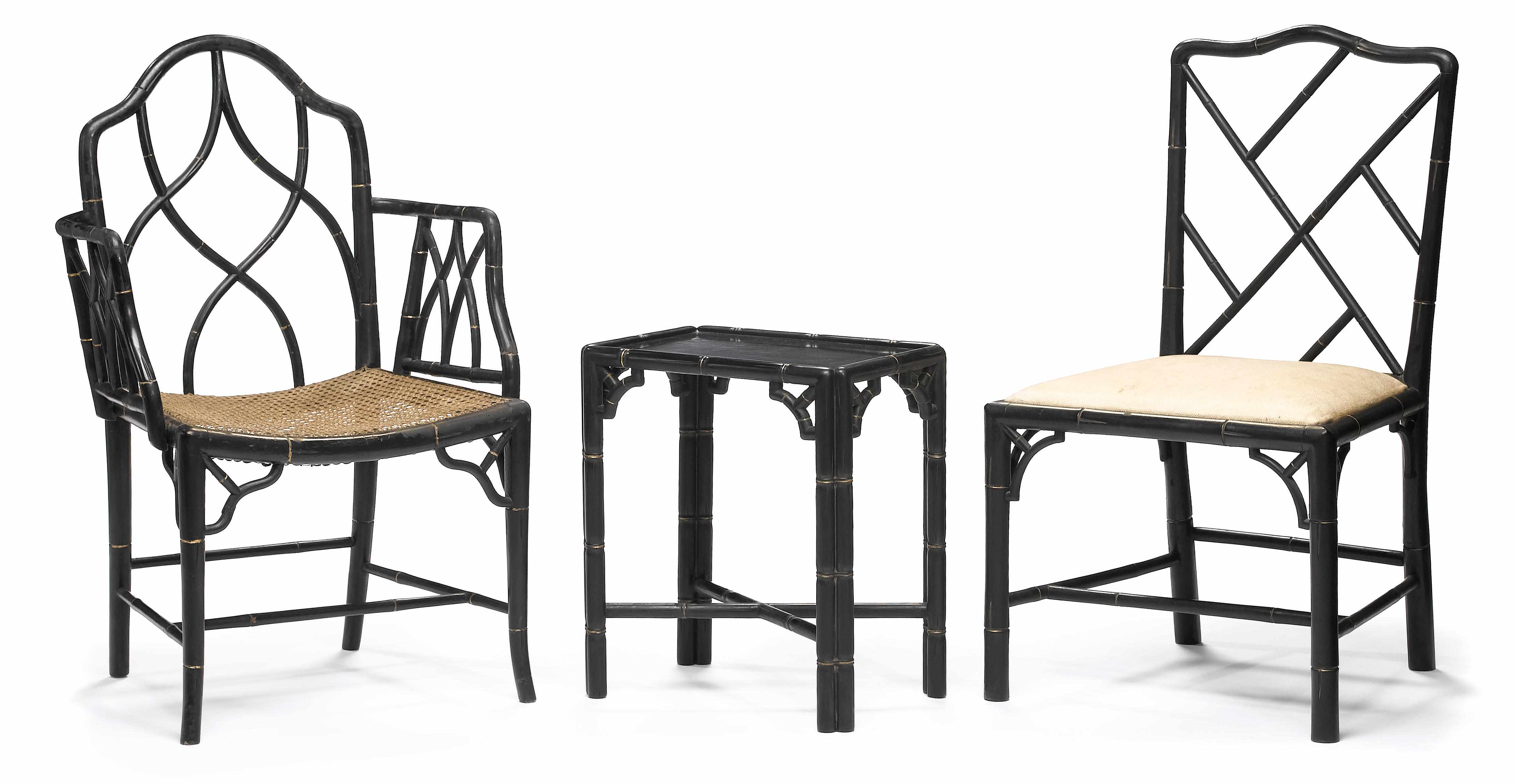 Appraisal: A suite of three Regency parcel gilt and ebonized armchairs