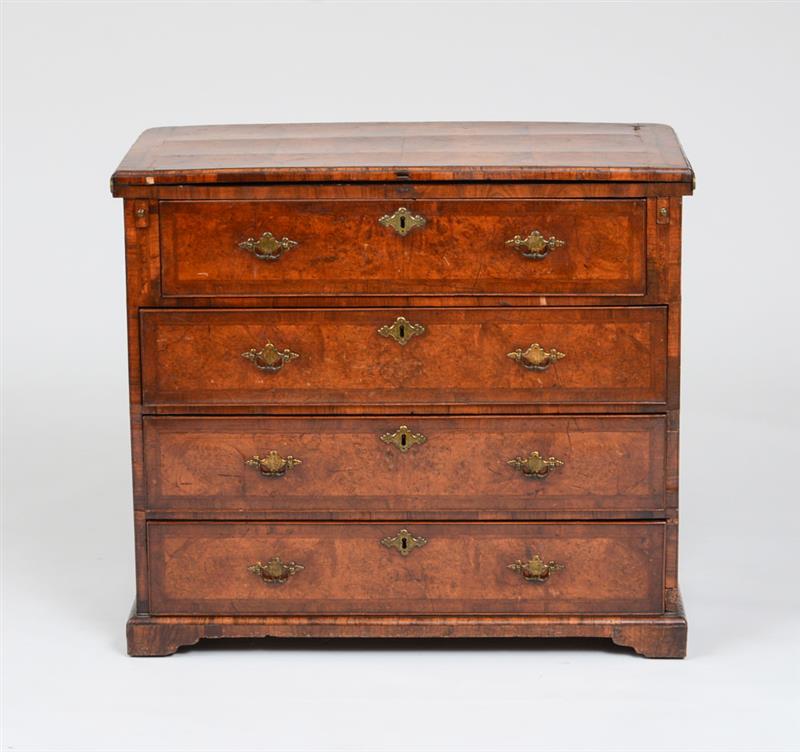 Appraisal: GEORGE I WALNUT CHEST OF DRAWERS Fitted with a hinged