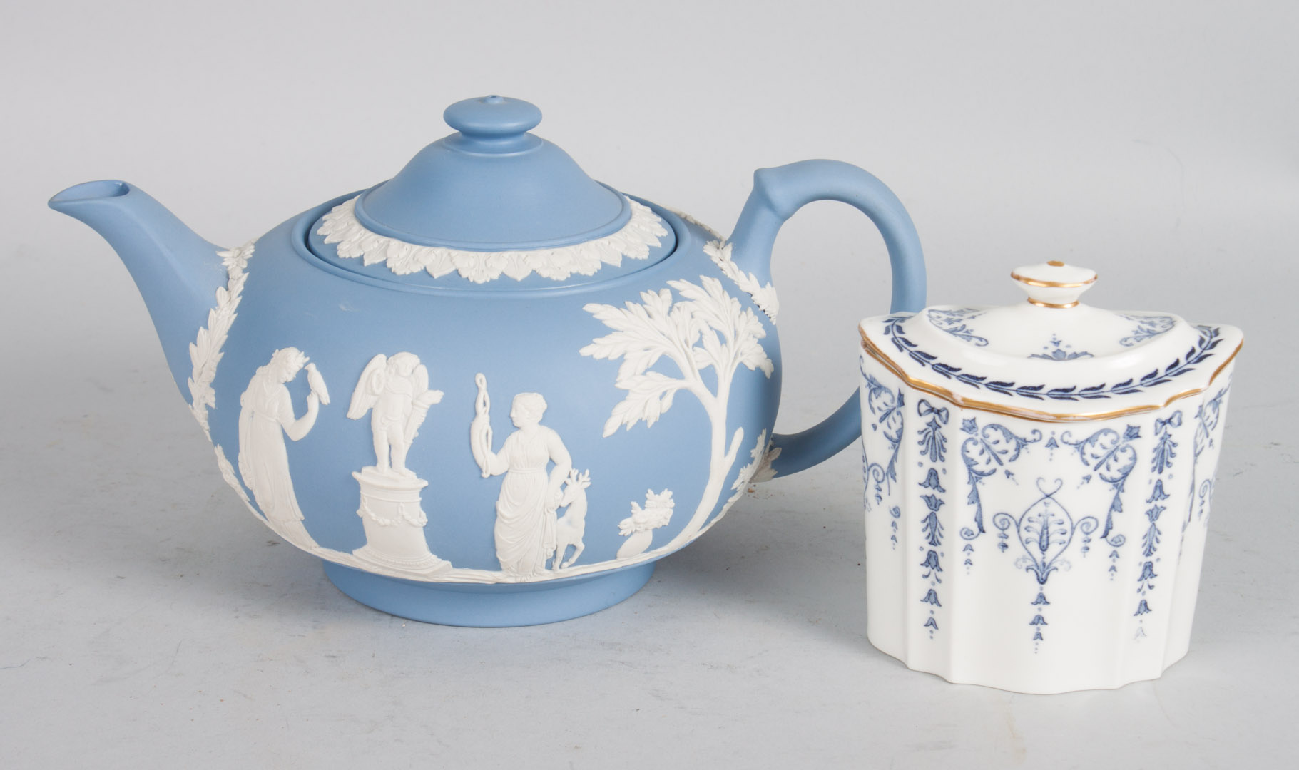 Appraisal: Wedgwood teapot and tea caddy blue and white jasperware teapot