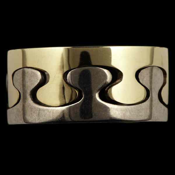 Appraisal: Ed Levin Two-Toned Ring Signature Ed Levin puzzle ring in