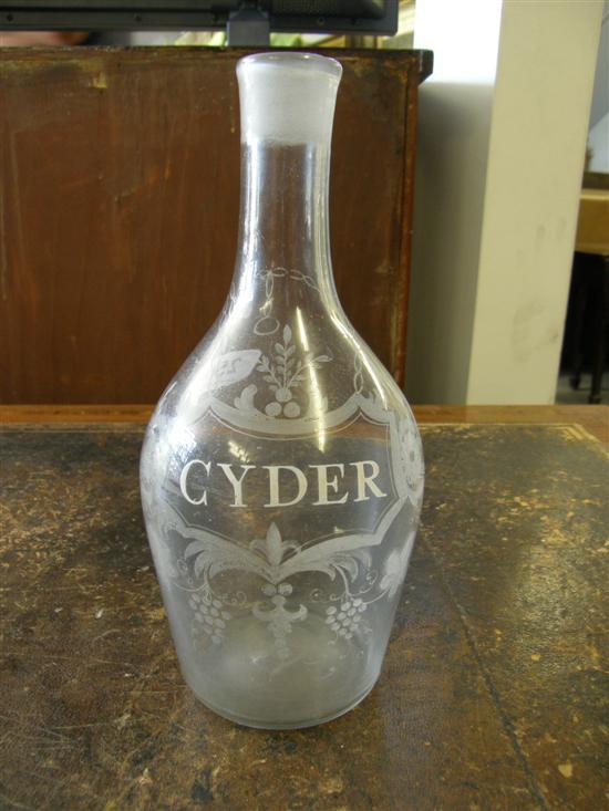 Appraisal: An early th Century clear glass decanter with engraved cartouche