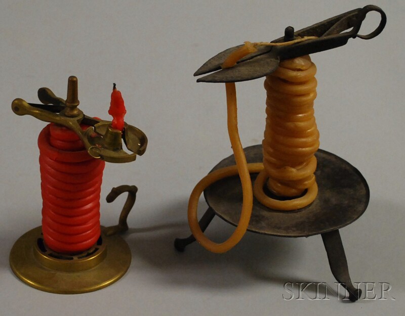 Appraisal: Two Taper Jacks one wrought and sheet iron on a