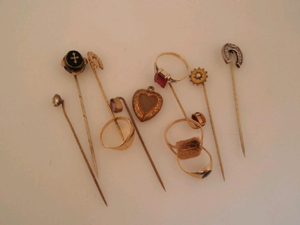 Appraisal: A mixed lot of stick pins and signet rings and