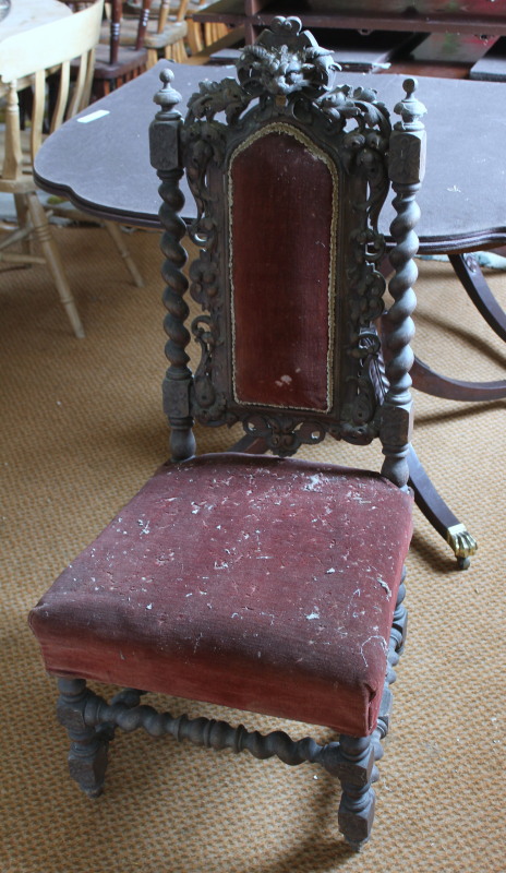 Appraisal: A Victorian carved oak Carolean style chair