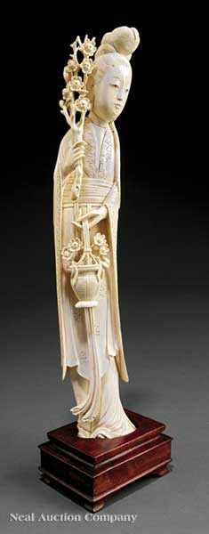 Appraisal: A Chinese Ivory Figure of a Beautiful Maiden elegant standing