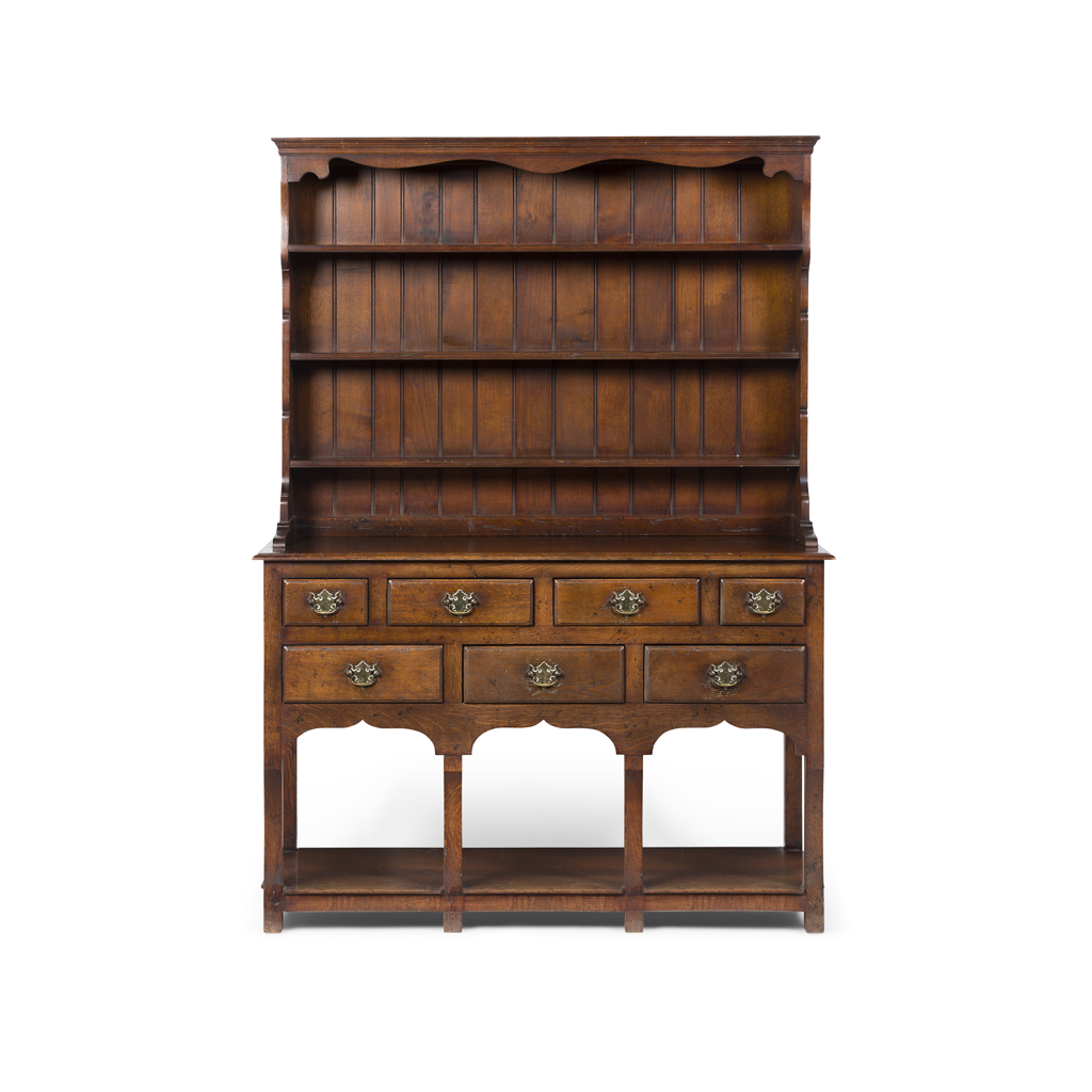 Appraisal: GEORGIAN STYLE OAK DRESSER EARLY TH CENTURY the moulded corned