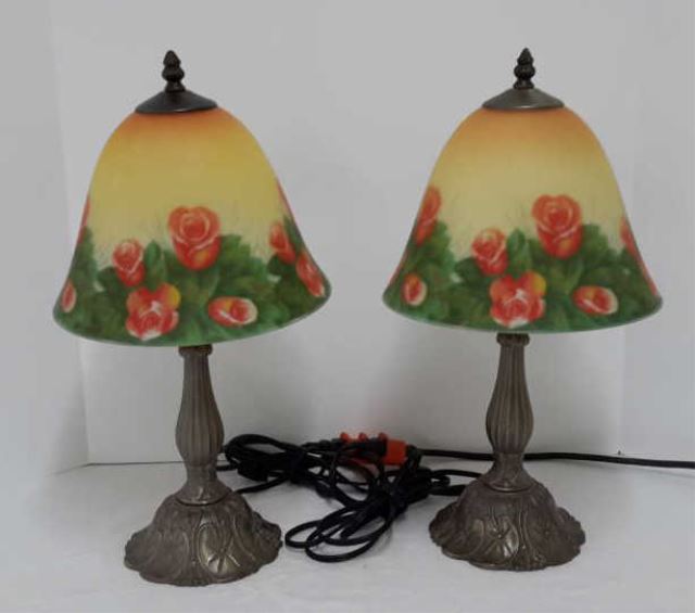 Appraisal: Reverse Painted Frosted Glass Parlor Lamps Created in the late