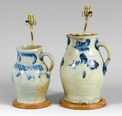 Appraisal: Two salt glaze stoneware pitchers one - gallons with cobalt