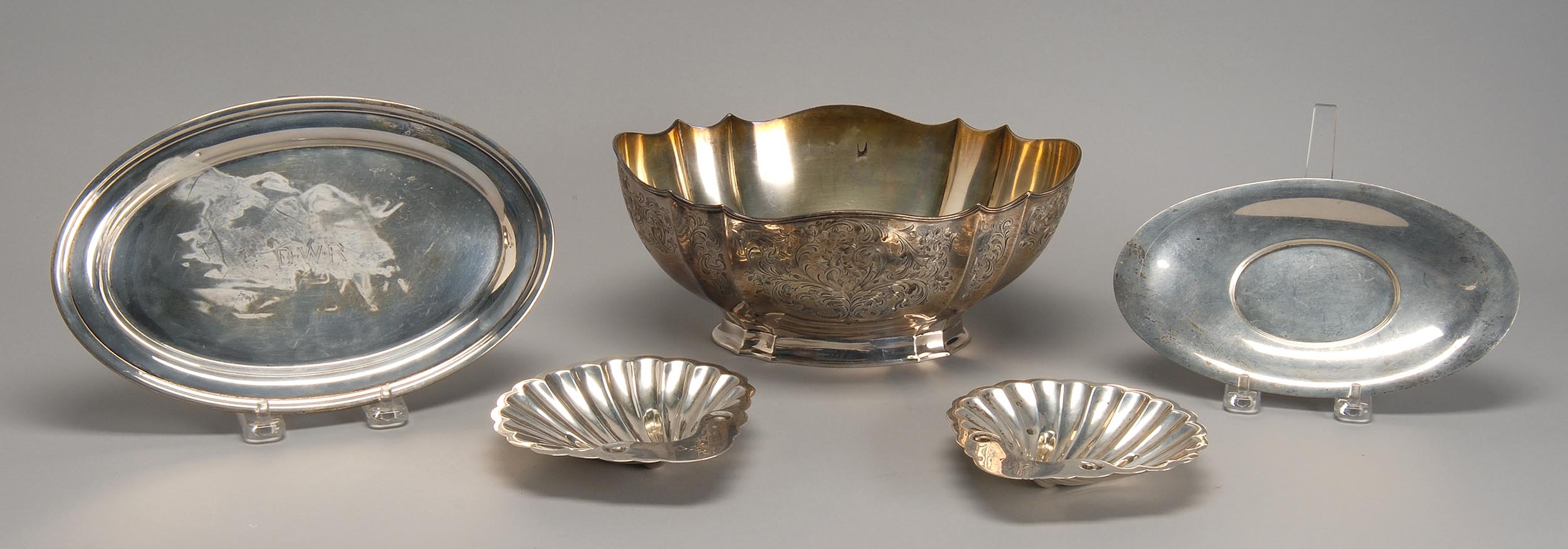 Appraisal: FIVE STERLING SILVER ITEMS an oval footed bowl height length