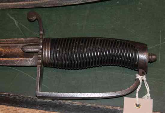 Appraisal: A Georgian cavalry officer's sword curved blade with crowned GR