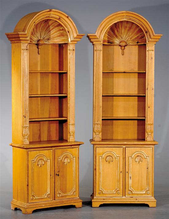 Appraisal: Pair heart pine bookcases Chapman molded domed bonnet with shell