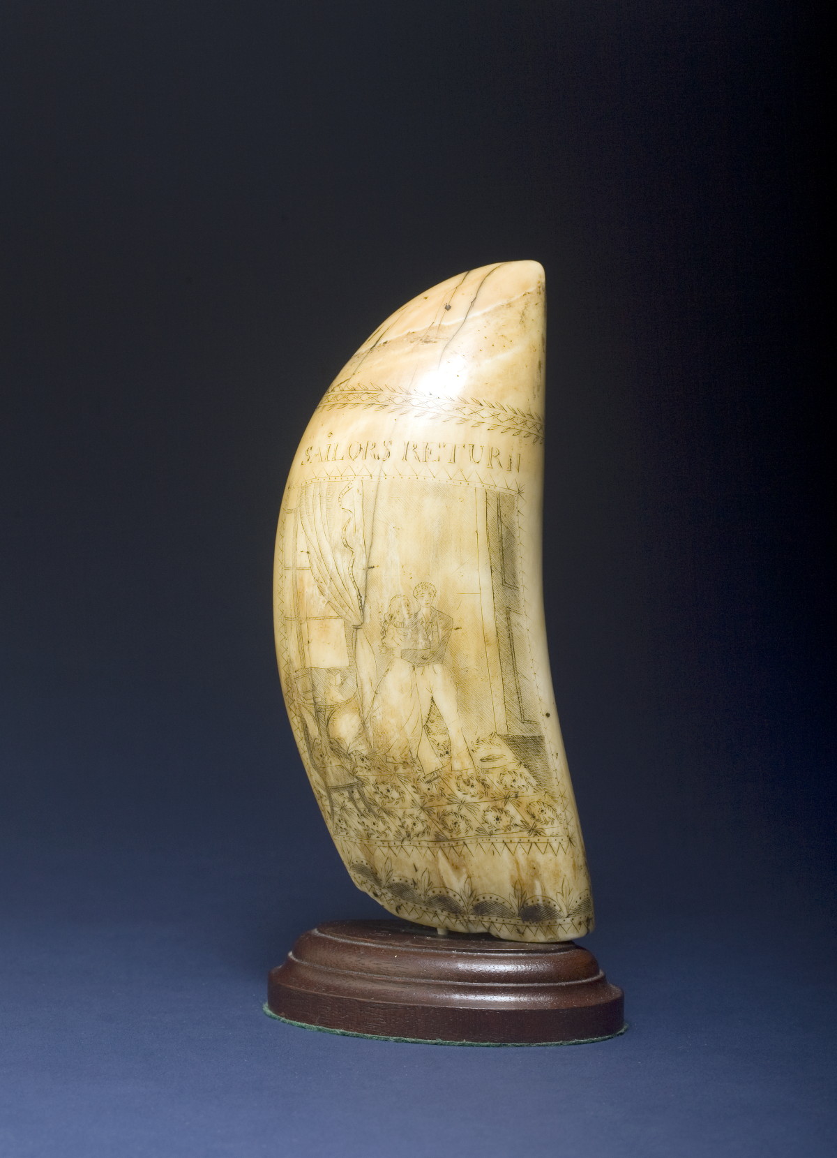 Appraisal: SCRIMSHAW WHALE'S TOOTH THE SAILOR'S DEPARTURE AND SAILOR'S RETURN Engraved